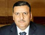 Afhopper. Riyad Hijab valgte at flygte til Jordan og forlod sin stilling som premiereminister i al-Assads regering. 