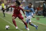 england. Santi Cazorla (t.h.) skifter fra Malaga til Arsenal. 