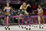 hop. Australske  Sally Pearson (midt)  var hurtigst over hækkene og vandt guld i tæt opløb med Dawn Harper. 
