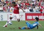 salgbar. Theo Walcott fik spilletid for Arsenal, da klubben spillede opvisningskamp i Hong Kong 29. juli. 