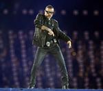 Kritik. George Michael har fået kritik for at ville promovere en ny single ved OL afslutningen søndag. 