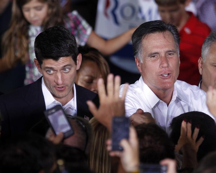 Upopulær. Paul Ryan (t.v.) er elsket af mange konservative republikanere, men mange amerikanere er skeptiske over for Mitt Romneys (t.h.) valg af ham som sin vicepræsidentkandidat. 