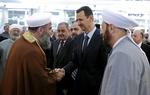 Eid. Assad havde lige tid til at hilse på muslimske gejstlige, før han skyndte sig tilbage til paladset. 