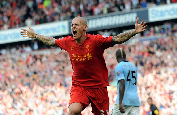 målscorer. Med et kraftfuldt hoivedstød scorede Martin Skrtel det første mål i 2-2-kampen mod Manchester City. 