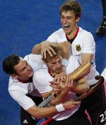 JUBEL. Tysklands hockeyhold var ekstatisk, da det vandt OL. 