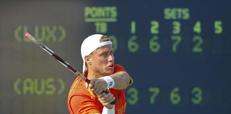 Hug. Lleyton Hewitt kom på overarbejde i New York. 