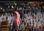 Kærlighedskilte. Michelle Obama blev modtaget af publikum i Charlotte, North Carolina, med en skov af skilte med teksten: 'Vi elsker Michelle'. 