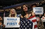 Middelklasse. Delegerede ved konventet i Charlotte følger den tidligere præsident Bill Clintons tale. 