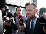 Former Special Adviser Peter Arnfeldt (right foreground) is being charged with leaking confidential information. 