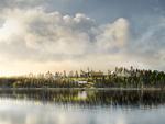 'Ny Utøya' set fra land. Renoveringen og genopbygningen af øen påbegyndes senere på efterået. Illustration af Mir AS, Architecture by Fantastic Norway AS 