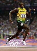 LØB! Usain Bolts tophastighed ligger på 44 km/t, mens en T-rex' ligger på 40 km/t. Her får han guld i London. 