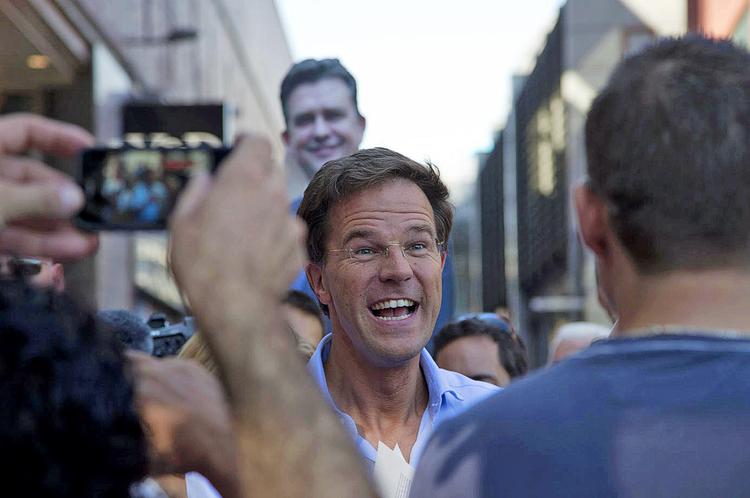 Slutspurt. Hollands liberale leder, Mark Rutte, kæmper til det sidste for at genvinde magten ved valget i dag. 