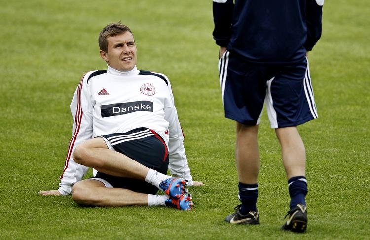 brud. Andreas Bjelland har spillet sig ind som fast mand i Twente og på landsholdet. Men den solide midterforsvarer må holde en lang skadespause. 