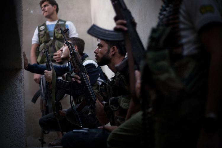 OPRRØR. Oprørerne i Syrien får angiveligt opbakning af militante såkaldte jihadister i kampen mod præsident Bashar al-Assad. 