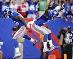 Jubel. Martellus Bennett (t.v.) i særpræget jubel med Ramses Barden (13) efter Bennetts scoring i sidste quarter. 