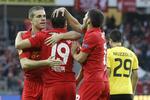 Glæde. Jordan Henderson, Stewart Downing og Daniel Pacheco jubler efter det første af aftenens otte mål. 