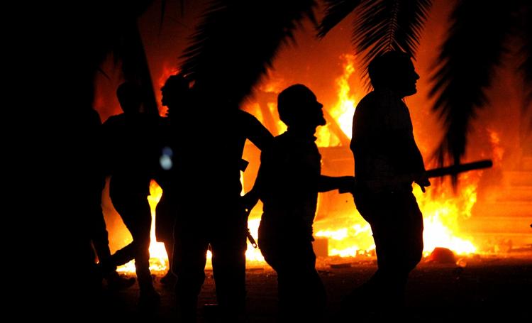 Fremgang. Der blev fejret i lyset af brændende biler og bygninger i og omkring Benghazi. 