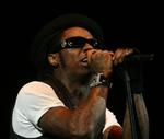Attitude. Lil Wayne er ikke en mand, man overser. Hans karakteristiske udseende og store talent har gjort ham til idol for mange. 