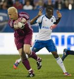 feriepengeafslag. Jimmy Nielsen (tv) kaldes den 'hvide puma' i Sporting Kansas City, hvor han vogter målet. 