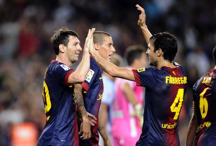Målhelt. Cesc Fabregas (th.) havde sin store andel i Barcelonas sejr over Sevilla. To mål blev det til. 