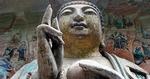 BUDDHA. Denne store sandstensfigur er bare én ud af tusinde, der er en del af UNESCO-stedet Dazu i det sydvestlige Kina. 