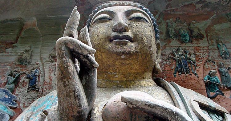 BUDDHA. Denne store sandstensfigur er bare én ud af tusinde, der er en del af UNESCO-stedet Dazu i det sydvestlige Kina. 
