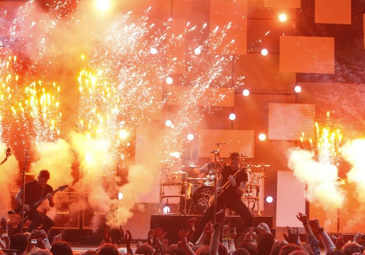 Nickelback. »Rockens svar på 'Fifty Shades of Grey«, kalder musikredaktør Pernille Jensen det canadiske band Nickelback. Måske er det noget for Roskilde Festivalen til næste år? Arkivfoto: AP 