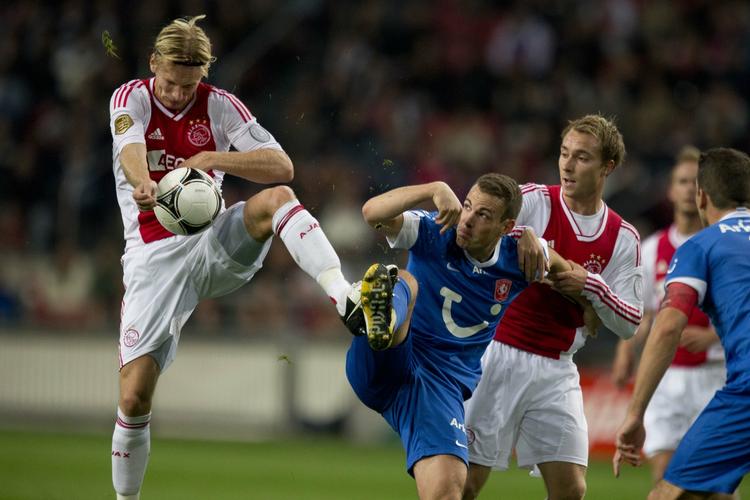 oprydder. Christian Poulsen (tv) har fået rollen som defensiv midtbanegardering foran Ajax' forsvar, hvor danskeren skal skærme af for modstandernes omstillingsspil. 
