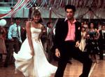 Grease. Ikke et sæde var tørt, når Danny charmerede Sandy på dansegulvet, og ingen øjne var det hellerm, når Sandy græd sine ud med skønsang, da når han knuste hendes hjerte. 35 år efter succesen synger de to sammen igen. 