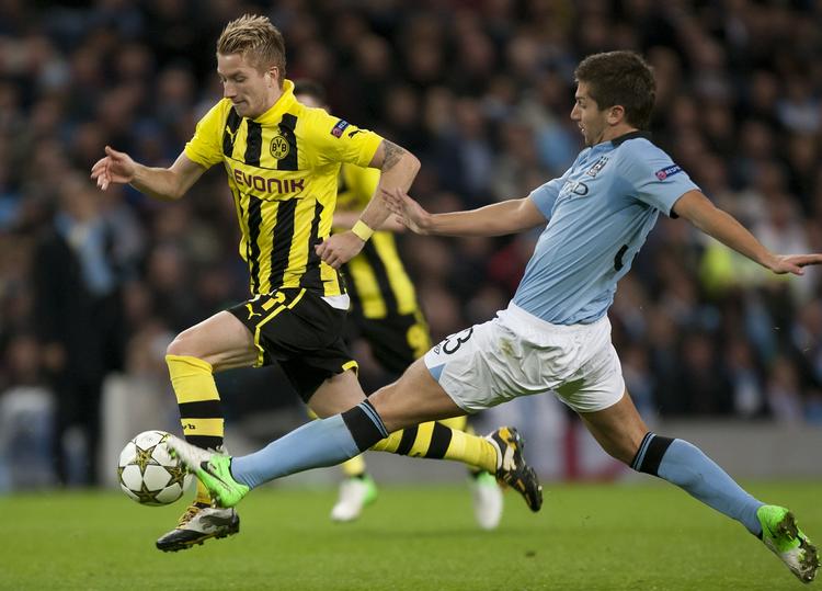 UAFGJORT. Med Marco Reus (tv.) som målscorer var Dortmund i 30 minutter foran mod Manchester City. 