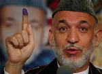 valg. Der har været skabt tvivl om, hvorvidt Afghanistans præsident, Hamid Karzai, ville holde fast i at afholde valg i 2014. Det vil han. 
