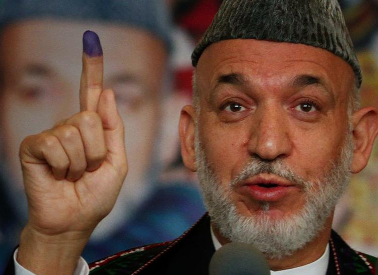valg. Der har været skabt tvivl om, hvorvidt Afghanistans præsident, Hamid Karzai, ville holde fast i at afholde valg i 2014. Det vil han. 