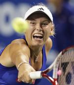 AGGRESSIV. Der var mere kraft i slagene end længe set, da Caroline Wozniacki tabte til verdens nummer 6, tyskeren Angelique Kerber. 