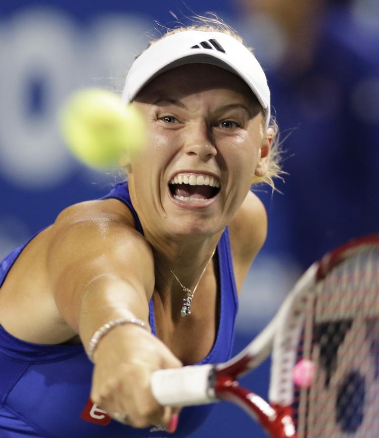 AGGRESSIV. Der var mere kraft i slagene end længe set, da Caroline Wozniacki tabte til verdens nummer 6, tyskeren Angelique Kerber. 