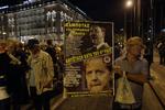 Protest. Hackergruppen Anonymous går nu efter græske hjemmesider samme dag som den tyske forbundskansler ankommer til Athen. 