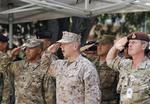 General. John Allen (i midten) leder i øjeblikket de internationale styrker i Afghanistan. Han står nu til forfremmelse. 