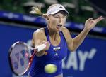 kvartfinalist. Med sit gamle varemærke, fight og vindervilje, fik Caroline Wozniacki kæmpet sig til sejr i dag over Li Na. 