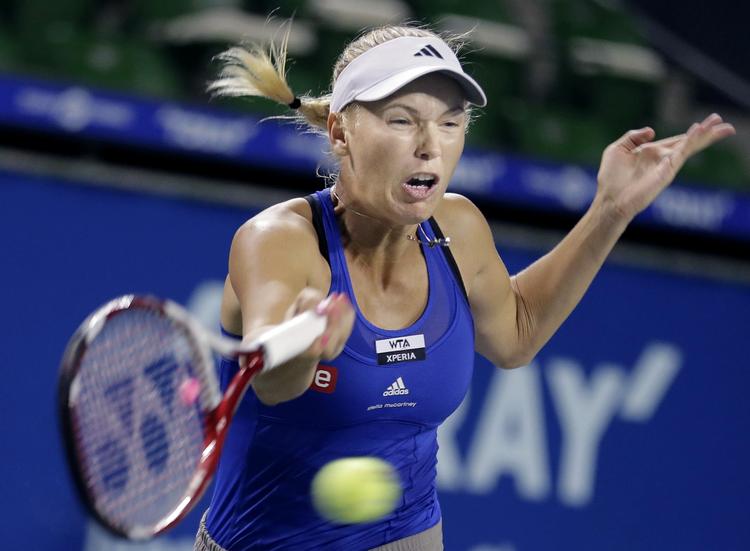 kvartfinalist. Med sit gamle varemærke, fight og vindervilje, fik Caroline Wozniacki kæmpet sig til sejr i dag over Li Na. 