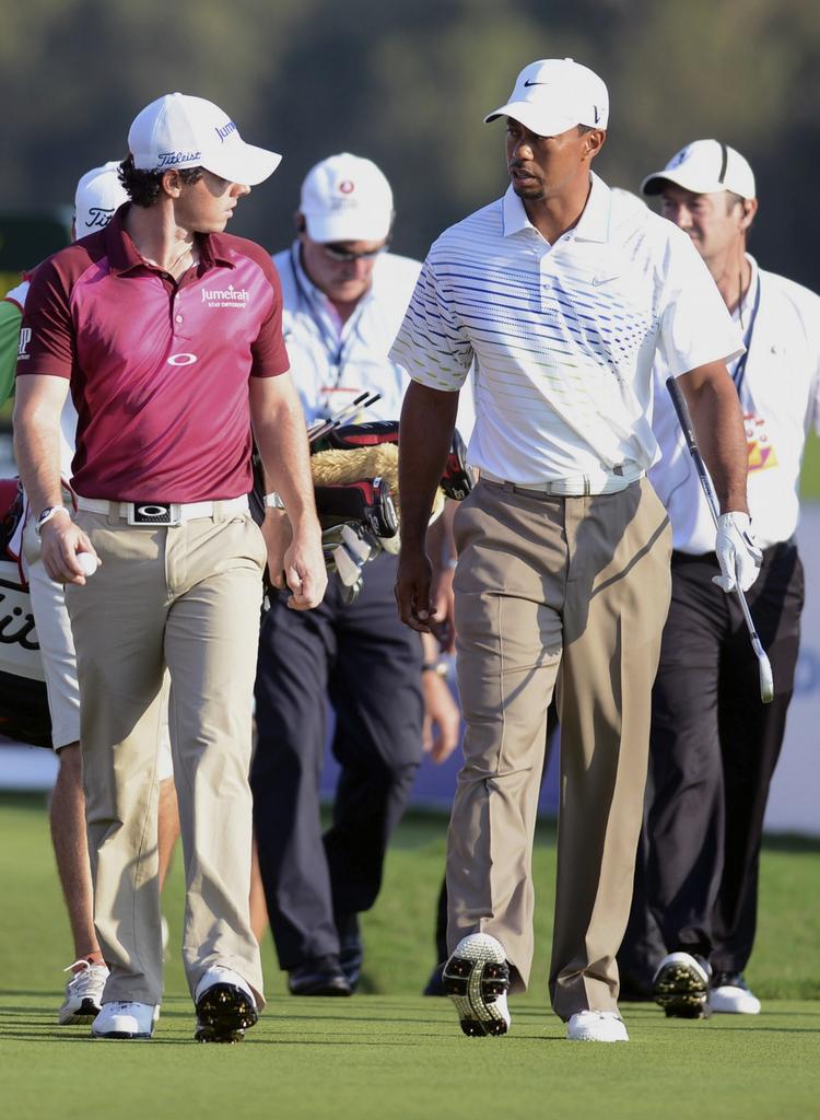 Videre. Tiger Woods (t.h.) gik banen i syv slag under par og ikke lavede en eneste bogey. 