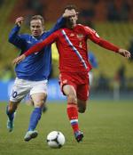 ubesejret. Vasili Berezutskiy (højre) og resten af det russiske mandskab har maksimumpoint efter de fire første kampe i VM-kvalifikationen. 