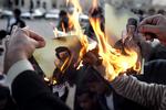 Human Rights Watch har fundet beviser for, at libyske oprørere henrettede 66 mennesker i forbindelse med drabet på Muamar Gaddafi. 