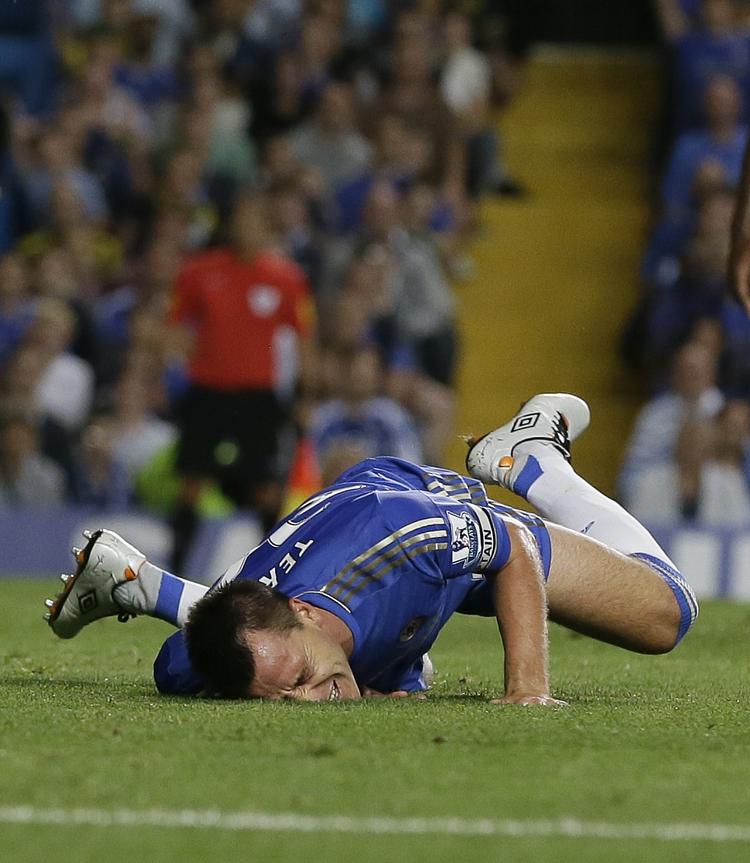 kaptajn. John Terry får lidt længere snor i Chelsea end på landsholdet. 