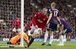 målrigt. Wayne Rooney var ikke mere rystet over sit tidlige selvmål end, at angriberen gik i den modsatte ende og scorede to gange. 