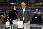 Tre'er. Vitali Klitsjko kommer ifølge prognoserne ind på en tredjeplads. Den tidligere mesterboksers nye Udar-parti får 12 procent af stemmerne. 