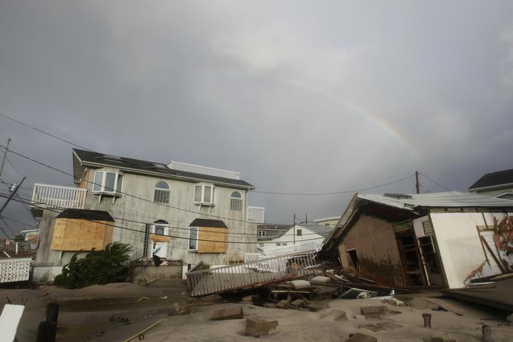 Orkanskadet. Et ødelagt hus ved Breezy Point i New York-bydelen Queens, som både har været ramt af oversvømmelser og en storbrand. 