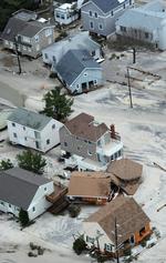 Huse ligger ødelagte tilbage på Beach Haven. 