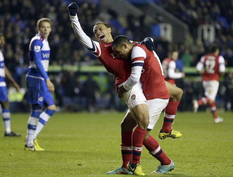 Jubi. Arsenal's Theo Walcott, (th.) og Francis Coquelin (tv.) jubler over målscoring. 