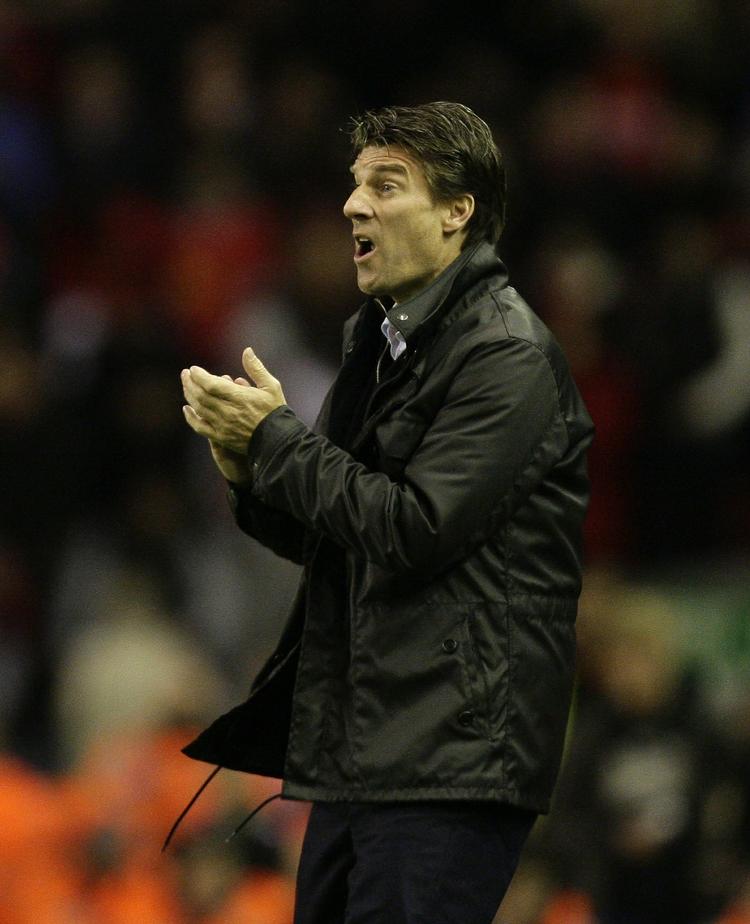 flot. Michael Laudrup klapper sine Swansea-spillere frem til dåd i pokalkampen mod Liverpool på Anfield. 