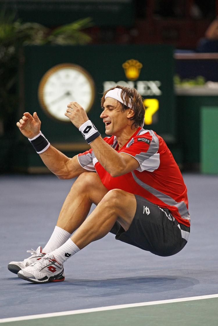 titel. Årets mest vindende, David Ferrer, kan lade sig falde til jorden efter veludført finale og sejr mod den polske sensation. 