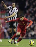 egoisten. Liverpools Luis Suarez (th) scorede et fantastisk mål, men var også for selvisk i sit spil i mange situationer mod Newcastle. 